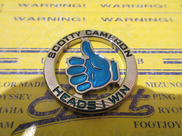 CAMERON COIN THUMBS UP